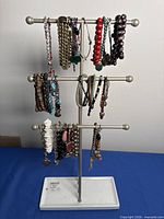 Overall view of metal stand with bracelets displayed