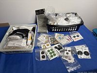 Overview showing elastic bin, button basket, packaged buttons and Gutermann trim