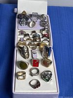 Entire open ring case showing full assortment of dinner rings