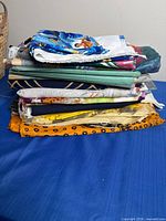 Stack of assorted folded fabrics