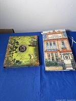 Both pop-up books closed, front covers visible