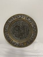 Front view showing full tray, border design and central damaged medallion