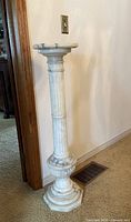Full view of marble pedestal front