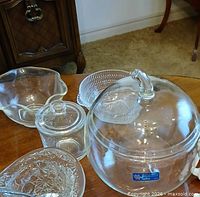 All four glass pieces grouped on table