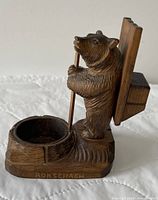 Left side profile showing bear, ash bowl, and RORSCHACH text