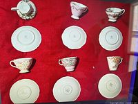Underside of cups and saucers showing maker marks