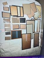 Front view of all frames laid out, various sizes and finishes