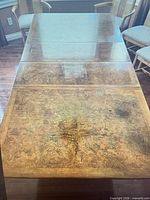 Top view showing burl veneer pattern and leaf inserts