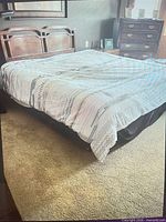 king size bed with wood headboard, mattress, box spring