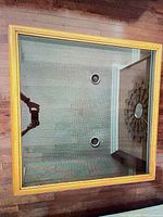 Top view showing tinted glass insert and oak frame