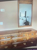 Front view of dresser with mirror showing finish and hardware