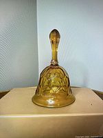 Amber glass hand bell front view