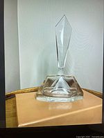 Full view assembled bottle with stopper on stand