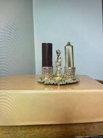 Front view of lipstick holder with both tubes in place