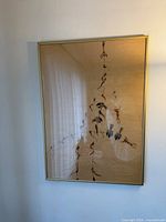 Full view of framed bird artwork on wall