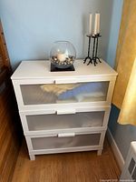 Front view of white BRIMNES 3-drawer chest showing frosted glass drawer fronts