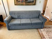 Front view of sofa showing entire piece and surrounding context