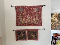 Full view showing all three tapestries and rods