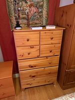 front view of the tall seven-drawer solid wood dresser