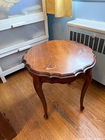 Top view showing scalloped edge and surface marks