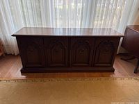 Front angled view showing full sideboard and door panel design