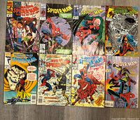 All eight Spider-Man themed Marvel comics laid out front covers visible