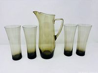 pitcher with four matching glasses front view