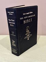 Angled view of front cover and spine showing title, edition, and condition