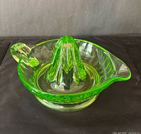 top view of green uranium glass juicer showing reamer cone and bowl