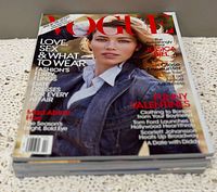 Stack of Vogue magazines with February 2010 issue on top showing Jessica Biel cover