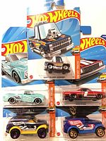 Front of all five carded Hot Wheels vehicles