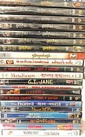 Stacked side-view of all 21 sealed DVD spines, titles readable