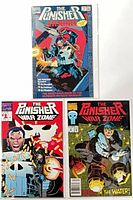 Front covers of all three comics showing titles and artwork