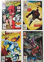 All four bagged and boarded Amazing Spider-Man issues laid out