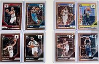 Front view of all 8 sleeved holo cards