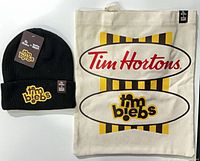Beanie and tote bag side by side showing overall appearance and logos
