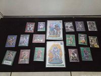 All 18 cards laid out showing fronts and two oversized cards