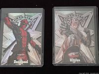 Front view of both sleeved cards