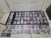 Full layout showing approximately 70 sleeved baseball cards