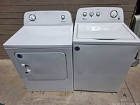 Front view of Amana washer and dryer side-by-side