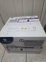 Sealed GE air conditioner carton full view