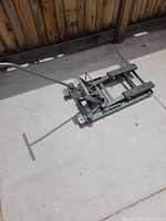 Full view of Pittsburgh hydraulic motorcycle lift on pavement