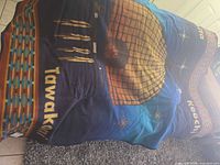Full view of blanket spread out showing design and wording