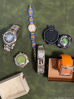 Group shot top view of all watches and watch heads