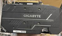 Backplate side of Gigabyte GTX 1660 graphics card with branding and model label
