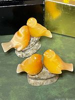 Both onyx dove sculptures frontal view