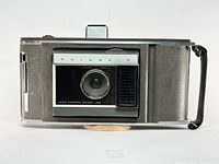 Front view showing lens panel, Polaroid branding and overall condition