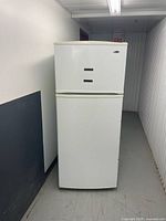 Front view of white Amana two-door refrigerator