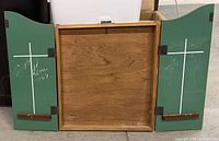 Interior view with green scoreboards and chalk ledges