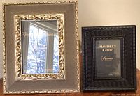 Front view of both photo frames showing designs and brand inserts